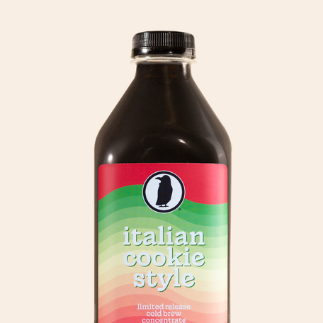 Plastic bottle packaging of 32oz cold brew concentrate labeled 'Italian Cookie Style - Limited Release Cold Brew Concentrate.'