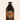 Bottle of limited release Peanut Butter Mocha Style cold brew concentrate with brown and orange label.