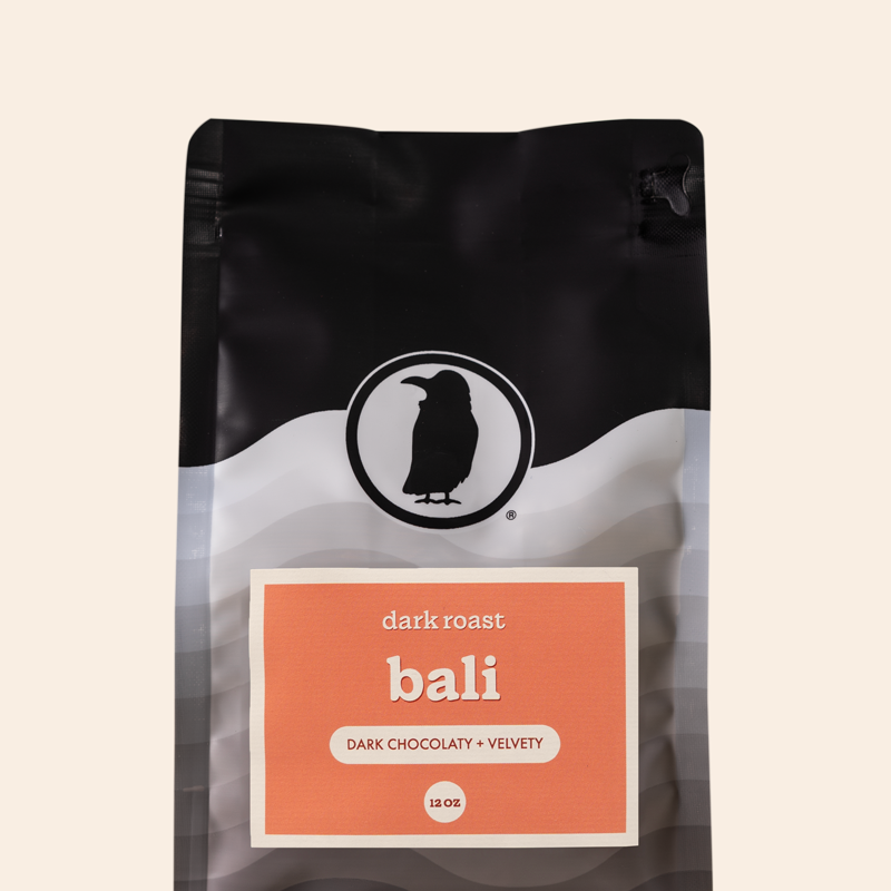 Packaging of a 12-ounce bag of dark roast coffee labeled 'Bali, Dark Chocolatey + Velvety,' featuring the Rook Coffee logo at the top. 