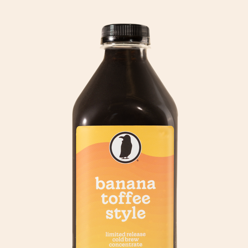 Bottle of Rook Coffee's Banana Toffee Style limited release cold brew concentrate with orange-yellow label.