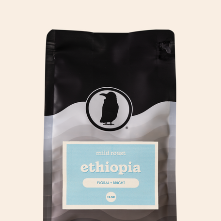 Packaging of a 12-ounce bag of mild roast coffee labeled 'Ethiopia, Floral + Bright,' featuring the Rook Coffee logo at the top. 