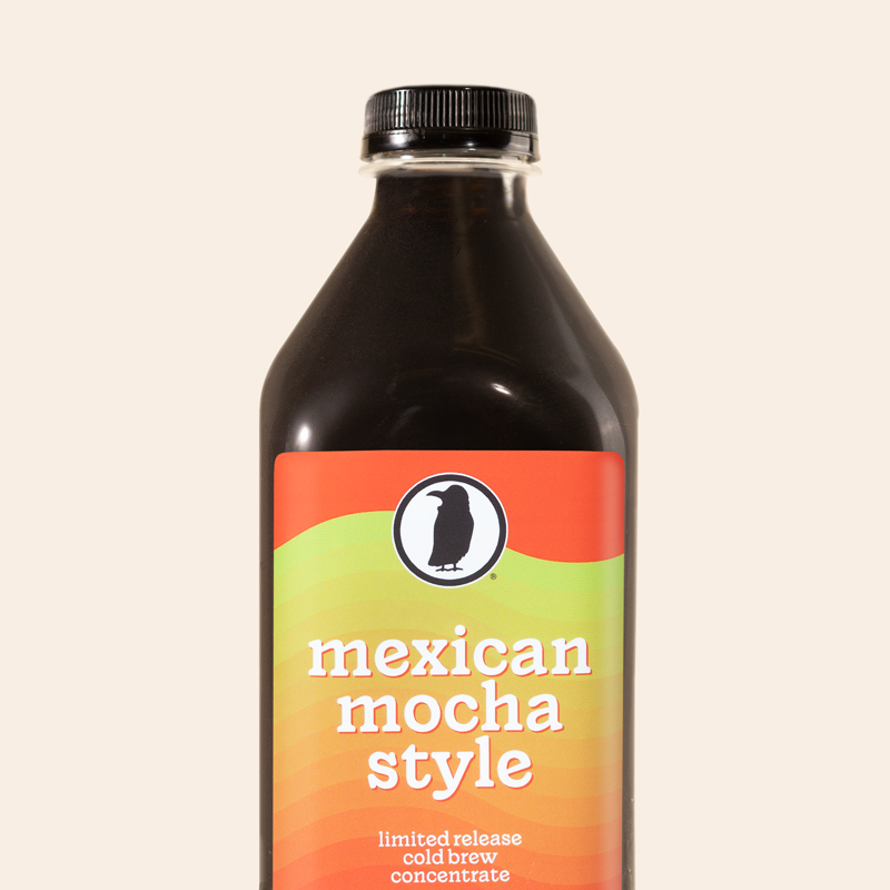 Bottle of Rook Coffee's Mexican Mocha Style limited release cold brew concentrate with green-red label.