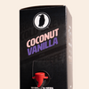 Black 100 brew box with 'Coconut Vanilla Style' text and a red tap dispenser on a beige background.