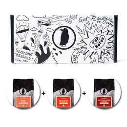 Rook-branded gift box with three bags of Rook Coffee below.