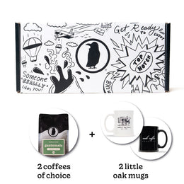 Rook-branded gift box with a bag of Rook Coffee and two branded mugs below. Text reads "1 coffee of choice" + "2 little oak mugs".