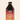A bottle of Rook Coffee's Maple New Orleans  Style cold brew concentrate with a maroon and orange gradient label.