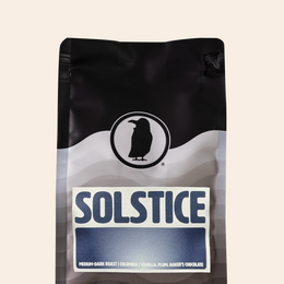 Rook Coffee Solstice medium-dark roast coffee bag with notes of vanilla, plum, and baker’s chocolate.