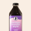 Plastic bottle packaging of 32oz cold brew concentrate labeled 'Coconut Vanilla Style - Limited Release Cold Brew Concentrate.'