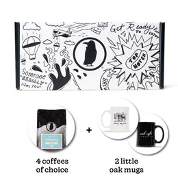 Rook-branded gift box with a bag of Rook Coffee and two branded mugs below. Text reads "4 coffees of choice" + "2 little oak mugs".