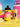 Bottle and cup of Rook Cinnamon Vanilla Style cold brew on a beach with a pink cooler and beach ball on a yellow towel. 