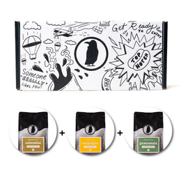 Rook-branded gift box with three bags of Rook Coffee below.